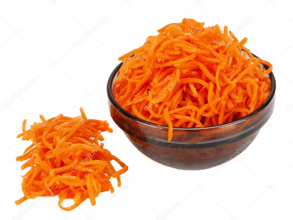Korean carrot in a glass plate close-up on a white