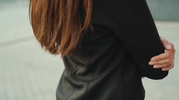 Young adult businesswoman standing in suit, crossed hand on chest — Stock Video