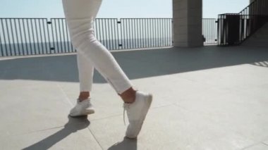 Child girl whirl around, making graceful dancing performance