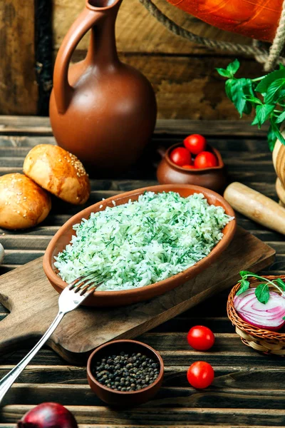 Rice mixed with herbs in plate — Stock Photo, Image