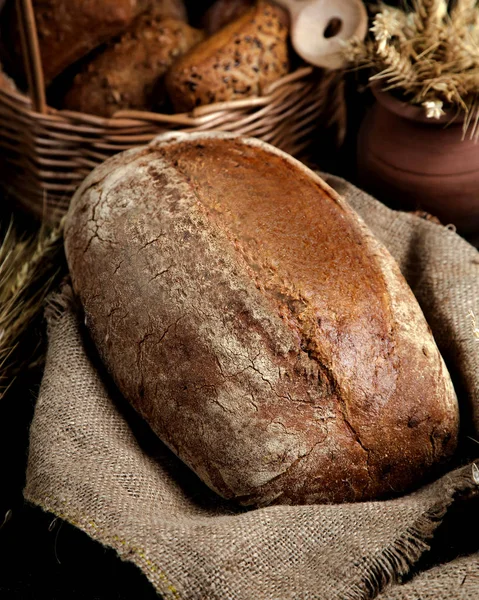 Loaf of bread with whole-wheat flour — Stock Photo, Image