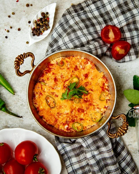 Top view of egg and tomato dish with spicy green — Stock Photo, Image