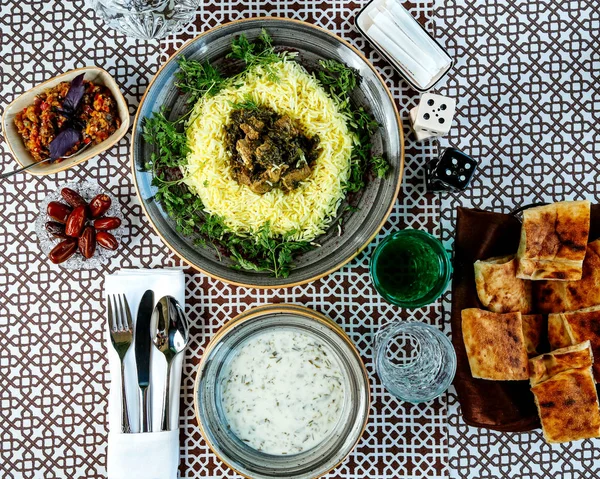 Rice with meat and side herbs — Stock Photo, Image