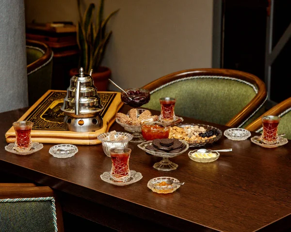 Traditional azerbaijani tea setup with jam, dessert and nuts — Stock Photo, Image