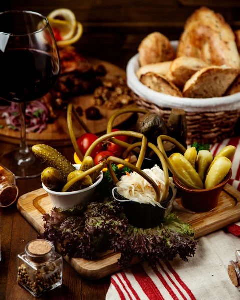 Mixed pickles on cutting desk — Stock Photo, Image