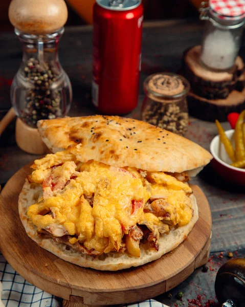 Doner in the pita bread with chear — стоковое фото