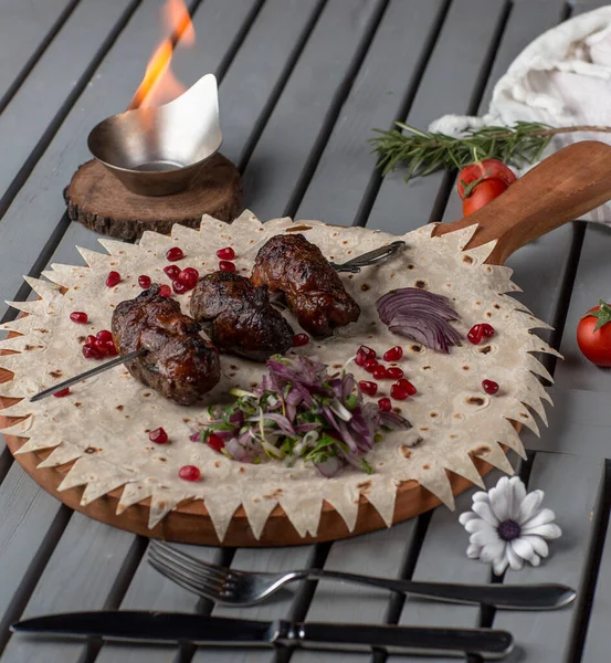 Fried kidneys on wooden board — Stock Image Fried kidneys on wooden board Royalty Free Stock Images