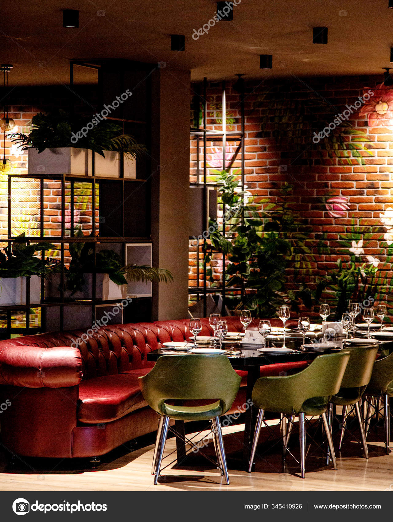 Cafe Lounge With Red Sofa And Plant