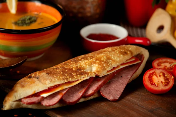 sausages in bread topped with sesame