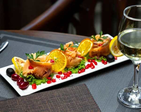 Fish with lemon and pomegranate _ — 스톡 사진