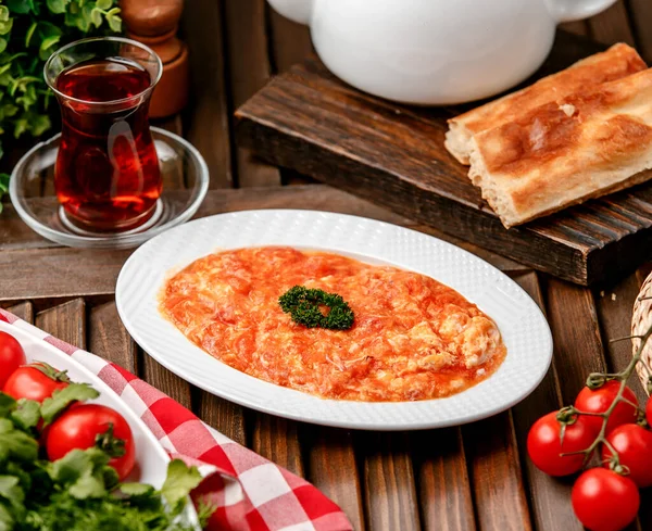 Fried tomatoes with eggs on the table _ — Φωτογραφία Αρχείου