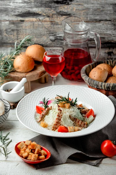 Chicken caesar salad on the table _ — Stockfoto