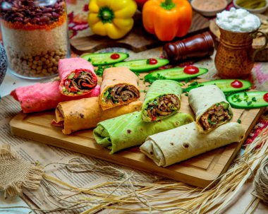 colourful flatbread wraps with beef and chicken