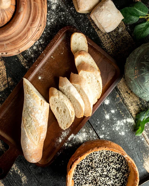 Top View Bread Baguette Board Sesame Buns Table — Stock Photo, Image