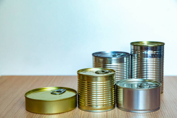 a tin can,an iron can, is on the table