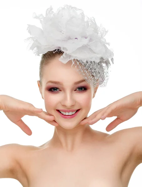 Beautiful girl in a wedding hat over white background. — Stock Photo, Image