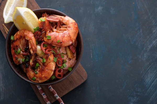 Large grilled BBQ shrimp with sweet chili sauce, green onion and