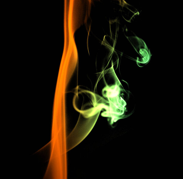 Colored smoke on a white background, abstract smoke swirls.