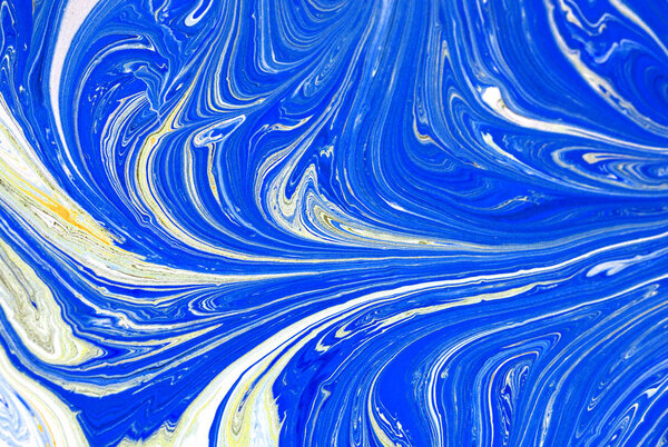 Liquid gold marbled pattern. Beige background