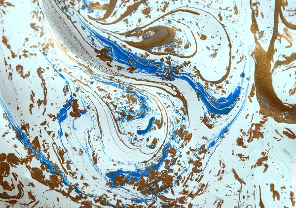 Blue, violet and gold marbling pattern. Golden marble liquid texture.