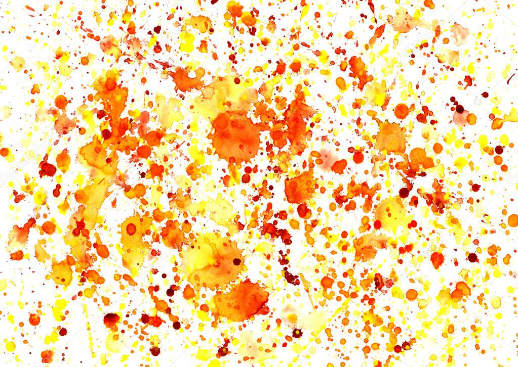 Abstract splashes of orange watercolor paint