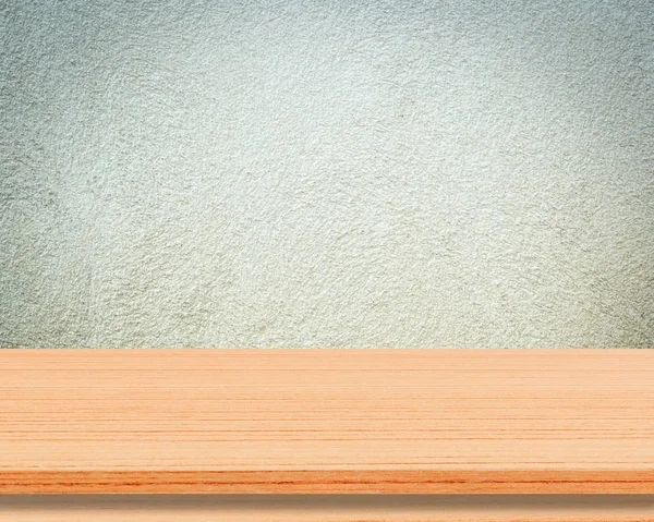 Mesa de madeira vazia sobre fundo de parede de cimento, montagem de exibição de produto — Fotografia de Stock