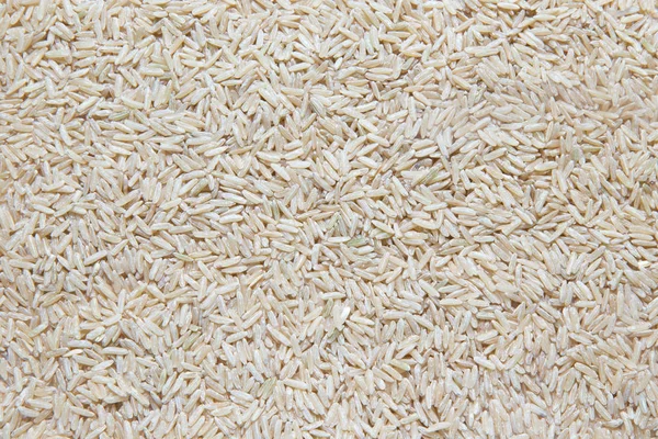 Roher brauner Reis Nahaufnahme, Hintergrund — Stockfoto