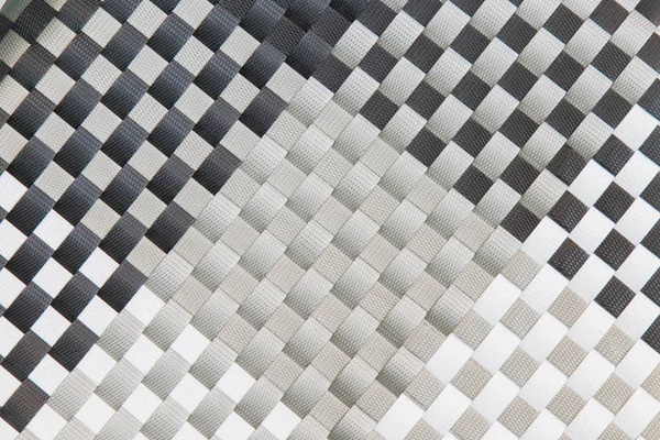 Fundo de plástico tecido em preto e branco . — Fotografia de Stock