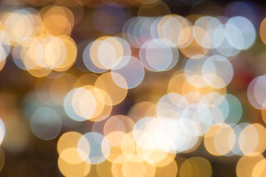 Gece lambasının soyut dairesel bokeh arkaplanı.