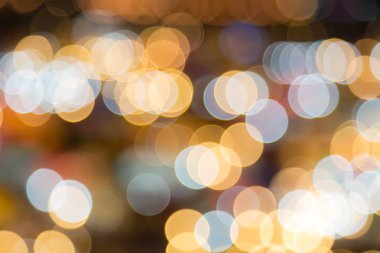 Gece lambasının soyut dairesel bokeh arkaplanı.