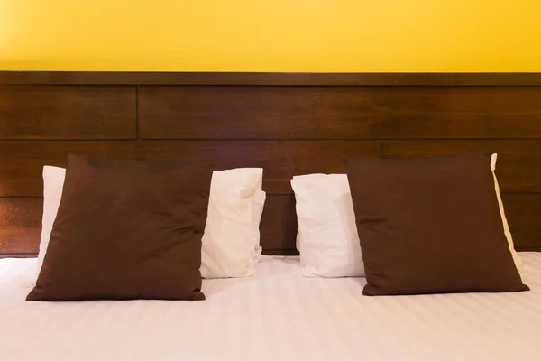 Bed in a hotel room at night, Thailand.