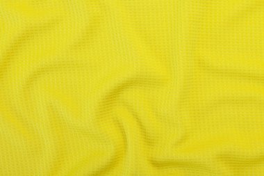 Sarı kumaş dokusu, kumaş deseni arkaplanı.