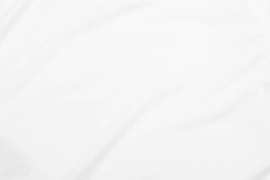 Yumuşak dalgalı beyaz kumaş dokusu.