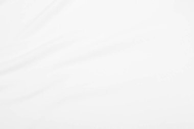 Yumuşak dalgalı beyaz kumaş dokusu.