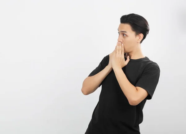 Young Asian Man Black Shirt Excited Hands Covering Mouth Isolated — Stock Photo, Image