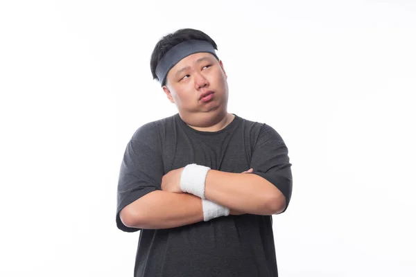Asijské Funny Tlustý Muž Sportovních Oblečení Paže Zkřížené Hledá Kopírovací — Stock fotografie