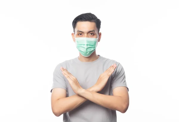 Joven Asiático Hombre Con Máscara Higiénica Gesto Parada Para Prevenir —  Fotos de Stock