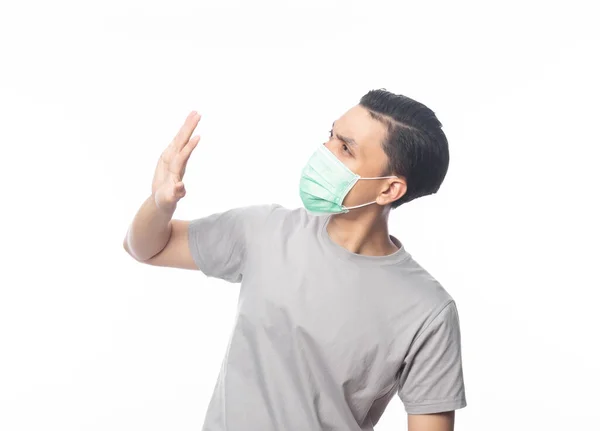 Young Asian Man Wearing Hygienic Mask Gesturing Stop Prevent Infection — Stock Photo, Image