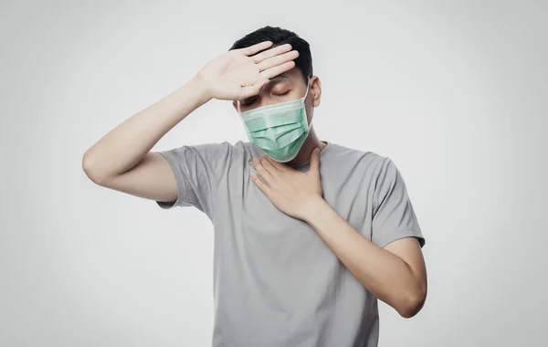 Young Asian Man Hygienic Mask Suffering Sore Throat Having Flu — Stockfoto