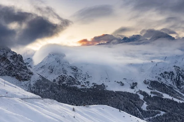 Sunrise over snow covered Alps in South Tyrol, Italy - Deep snow and blue sky