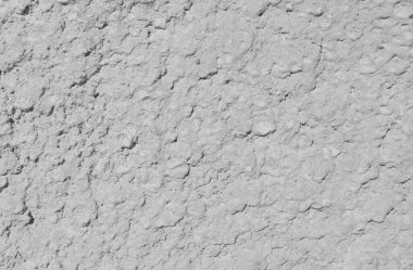 Beton bir duvarın gri dokusuna yakın çekim. Duvar kağıdı tasarımı için modern model. Grunge şehir arkaplanı