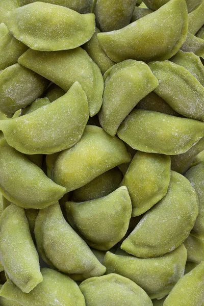 Frozen dumplings texture in a market fridge