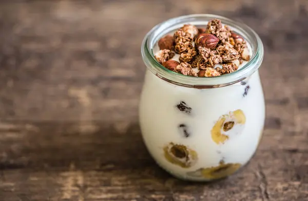 Yogurt with Muesli, Banana and Nuts — Stock Photo, Image