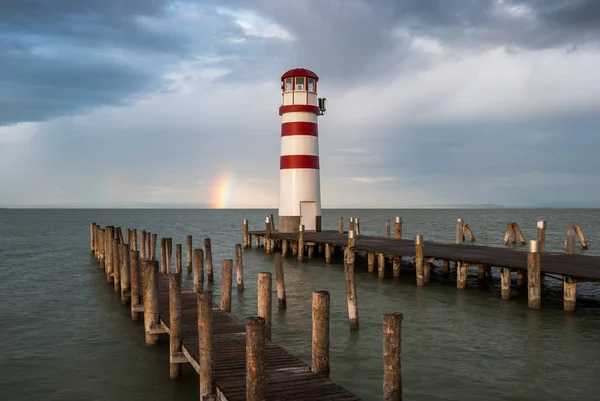Lighthouse with a Pier — Stock Photo, Image