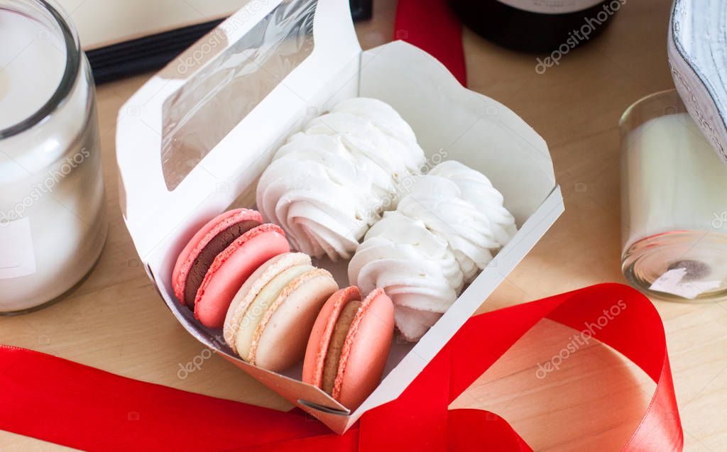 Gift box with macaroons and marshmallow