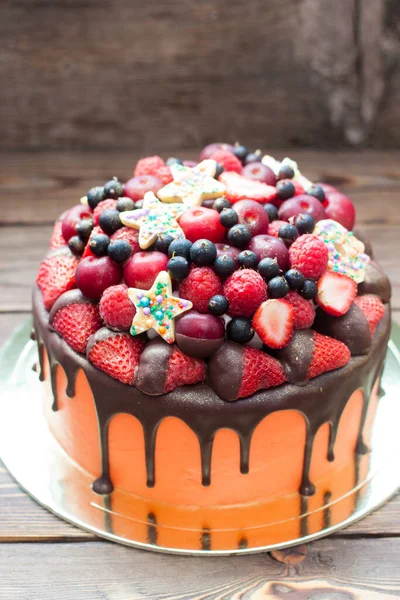 Orange Cake Melted Chocolate Fresh Berries Strawberries Raspberries Blueberries Cherries — Stock Photo, Image