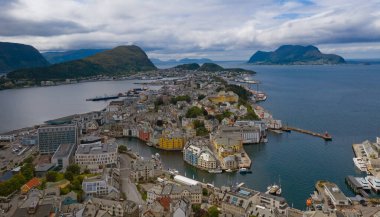 City Centre of Alesund from the Fjellstua Viewpoint on top of the mount Aksla, More og Romsdal, Norway. Aerial drone shot. July 2019 clipart
