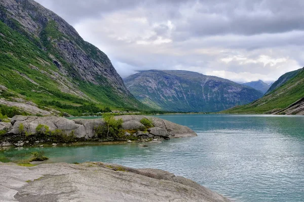 Lengua glaciar en retroceso Nigardsbreen - Parque Nacional Jostedalsbreen, Noruega —  Fotos de Stock