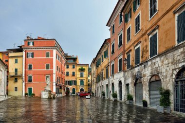 City of Carrara in rainy september day. Tuscany, Italy clipart