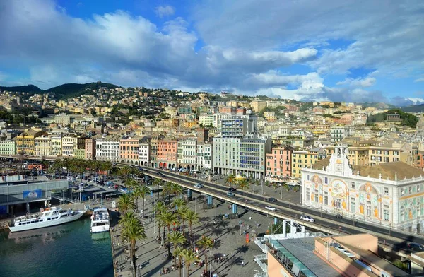 Top aerial scenic view from above of old historical centre quarter and modern districts of european city Genova and harbor of Ligurian and Mediterranean Sea, Liguria, Italy — стоковое фото